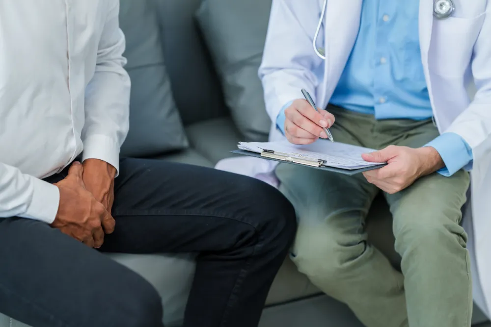 Doctor and male patient discussing prostate screening during a consultation