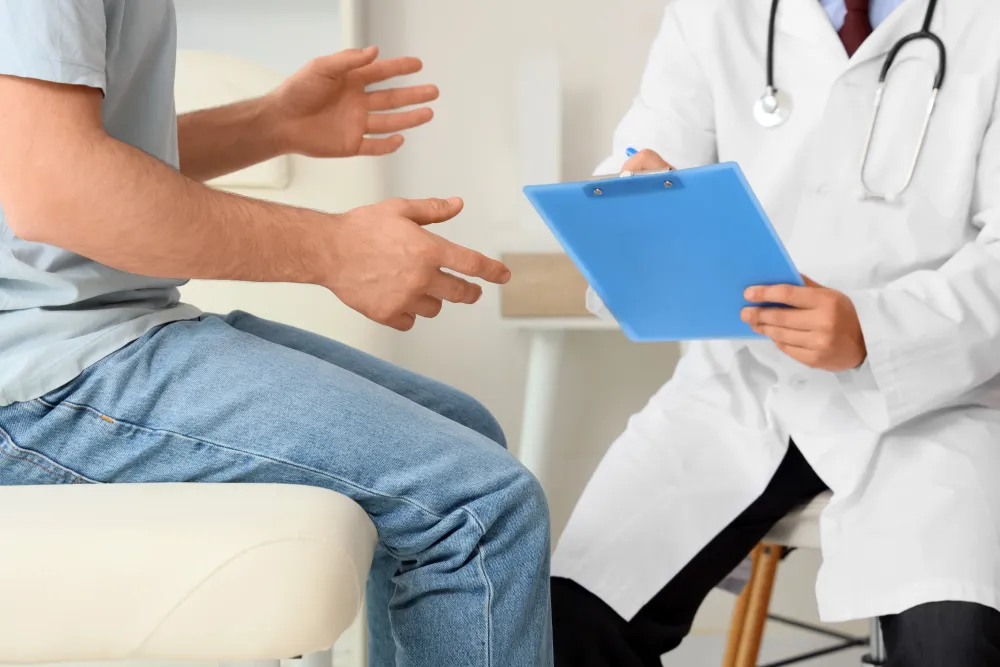 Young man visiting the doctor for a consultation